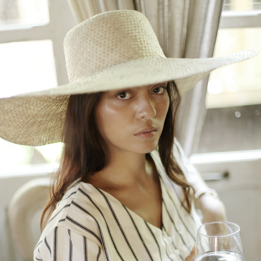 Swasti Wide Round Palm Straw Hat, in Nude Beige by BrunnaCo