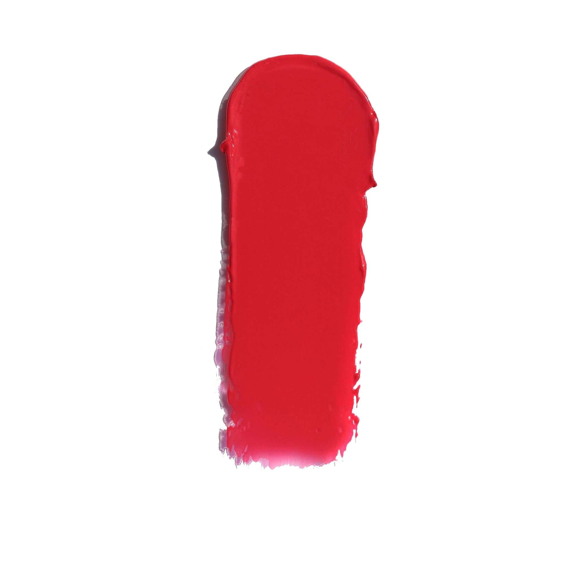 Swatch of Candy Paint Cheek + Lip Tint in a vibrant candy apple red shade with a dewy finish.