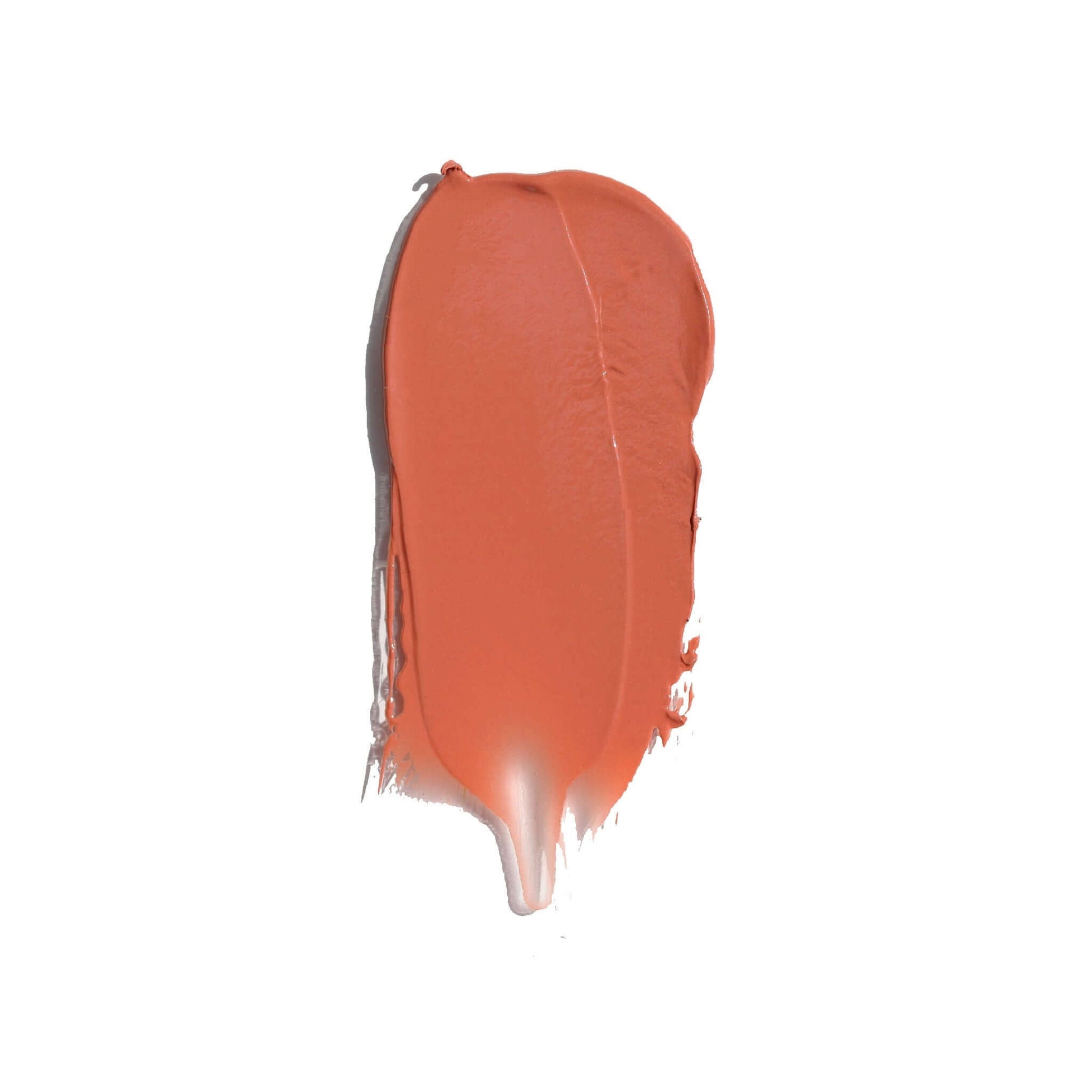 Swatch of Candy Paint Cheek + Lip Tint in a warm burnt orange shade, highlighting its creamy texture and dewy finish perfect for skin and lips.