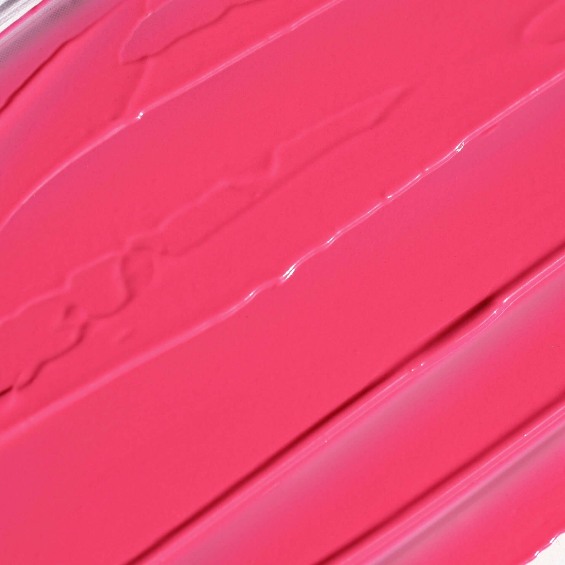 Close-up of Candy Paint Cheek + Lip Tint in shade revealing the creamy texture and dewy finish, perfect for a radiant and nourished look.