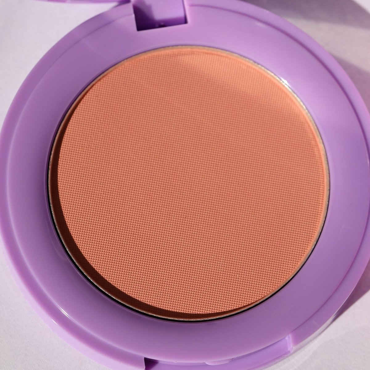 open purple compact with peach pan - In Bloom Powder Blush, me & u - Half Caked