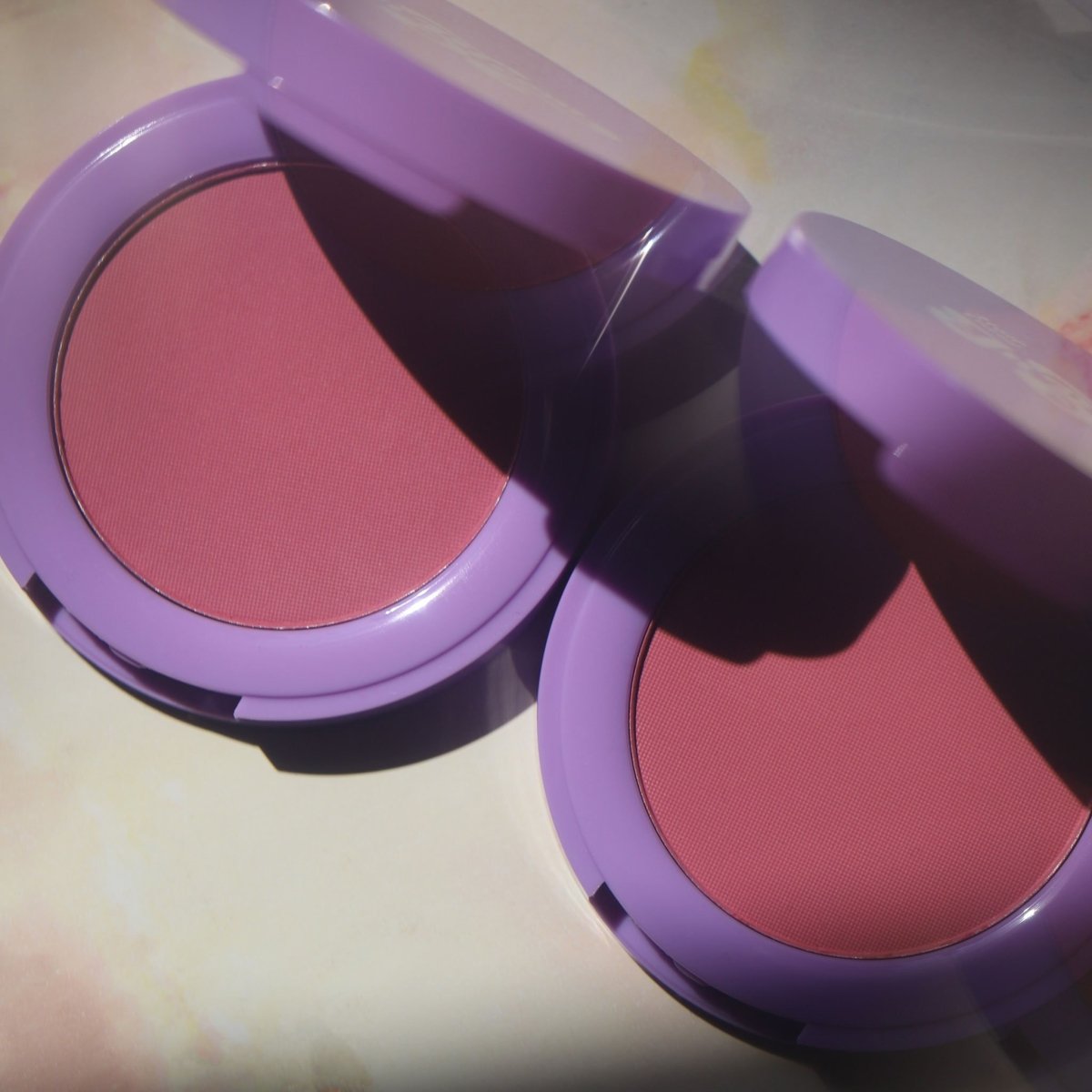 purple compacts with pink pans - In Bloom Powder Blush - Half Caked