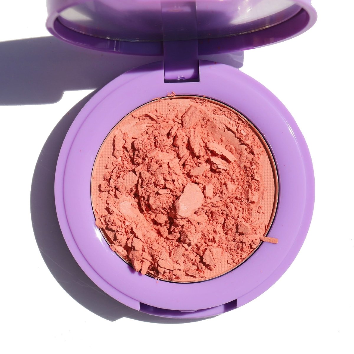 open purple compact with crushed peach pan - In Bloom Powder Blush, me & u - Half Caked
