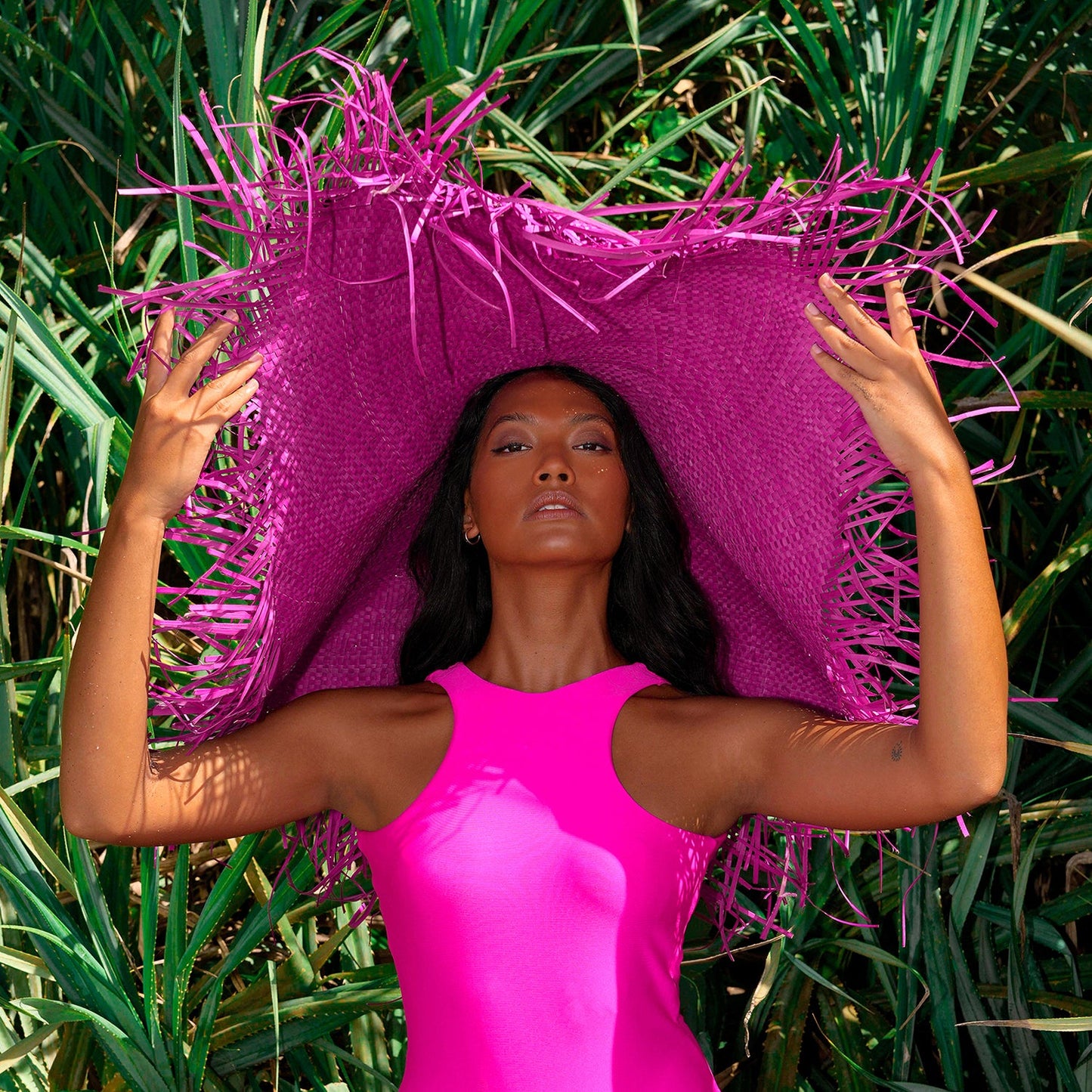 AMORA Oversized Woven Straw Hat in Hot Pink by BrunnaCo