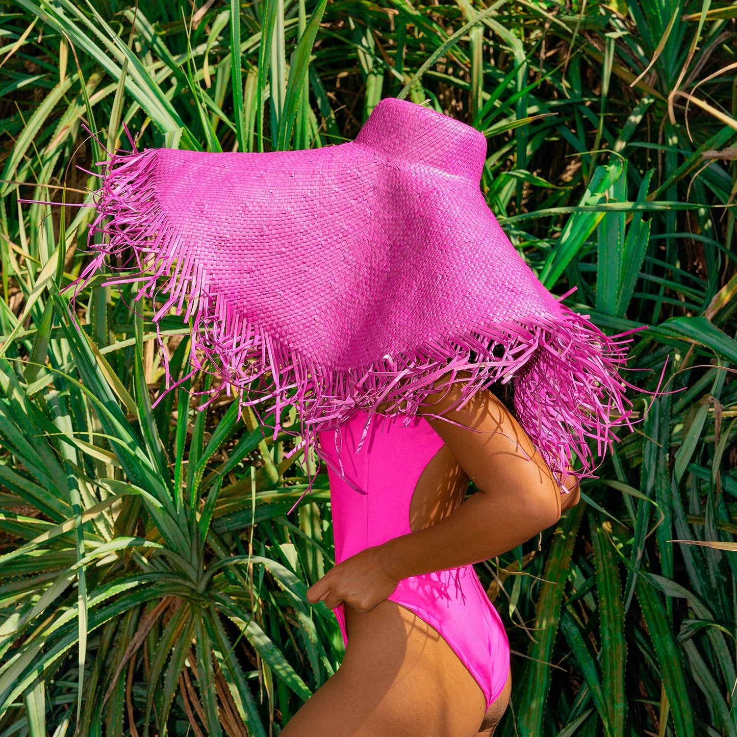 AMORA Oversized Woven Straw Hat in Hot Pink by BrunnaCo